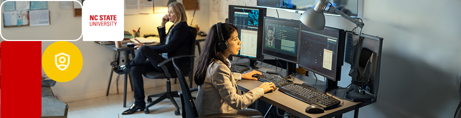 Working in front of a computer is one of the Essential Skills for a Cyber security Specialist