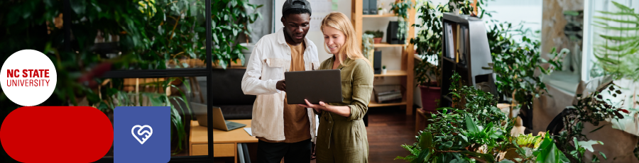 standing next to each other and he's showing her Relevant ISC2 Certifications for North Carolina's Job Market